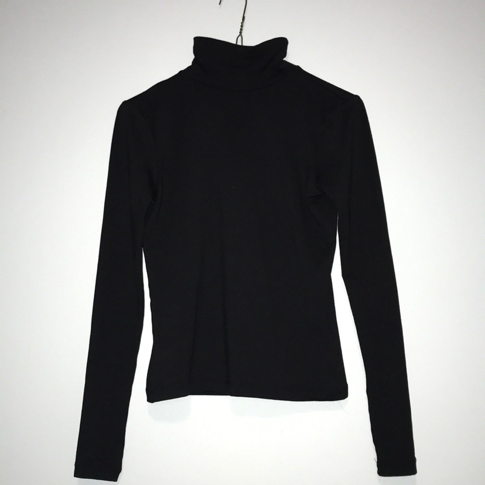 Super cute turtleneck with an opened back